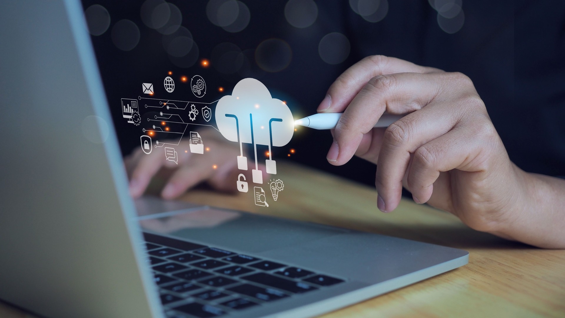 Futuristic business network concept. Businessman uses a Laptop with technology cloud computing for data transmission, database, data storage, and backup. Networking and internet service concept.